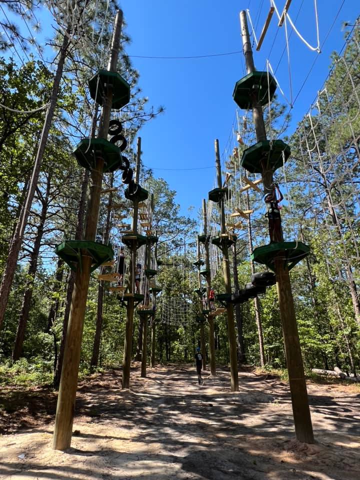 Challenge by choice! Test your skills and faith as you use problem solving to traverse multiple high ropes elements. Feeling daring? The aerial course has three levels of difficulty for even the seasoned veteran! All participants must be able to fit the harness.